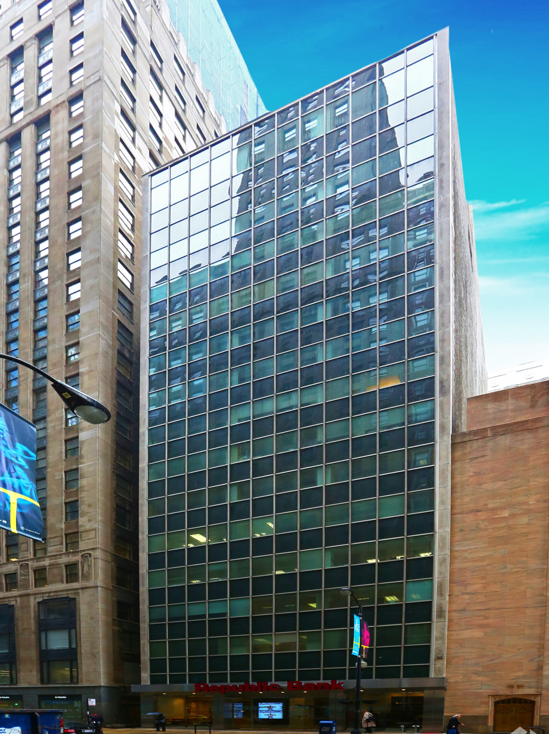 Exterior view of 120 W. Madison St., Chicago, IL 60602, a Class B office building in the heart of Chicago's Loop, surrounded by nearby amenities.