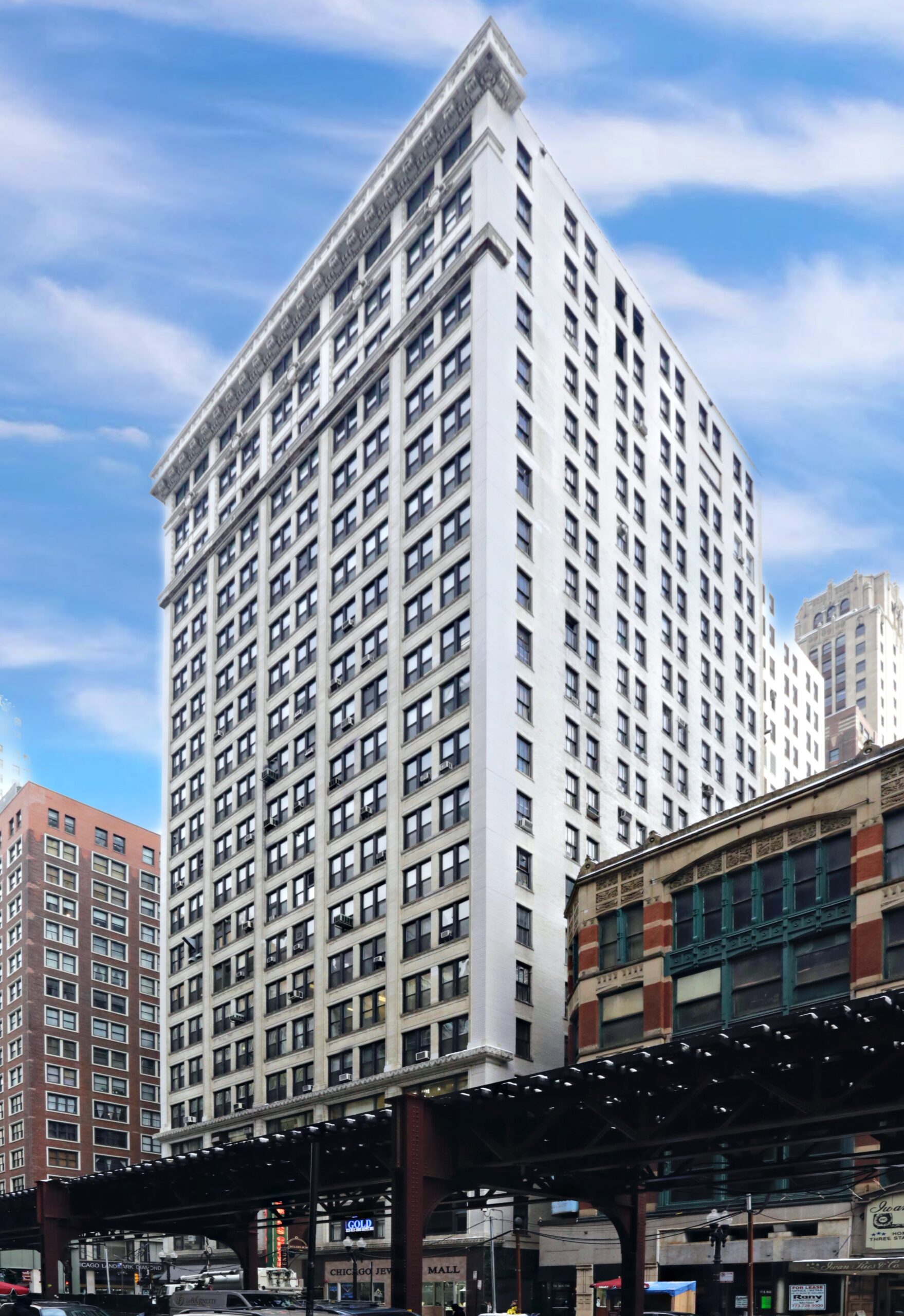 Exterior view of 67 E. Madison St., Chicago, IL 60603, a historic 21-story building in the Loop with art-deco styling and terracotta embellishments.